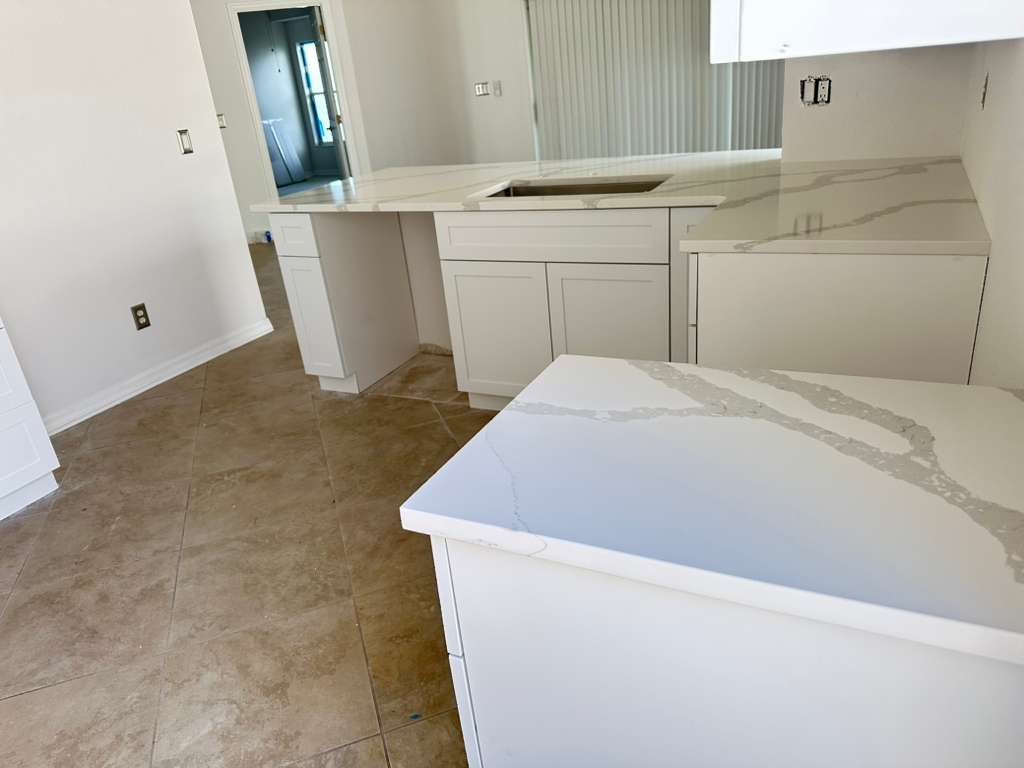 White kitchen island multifamily