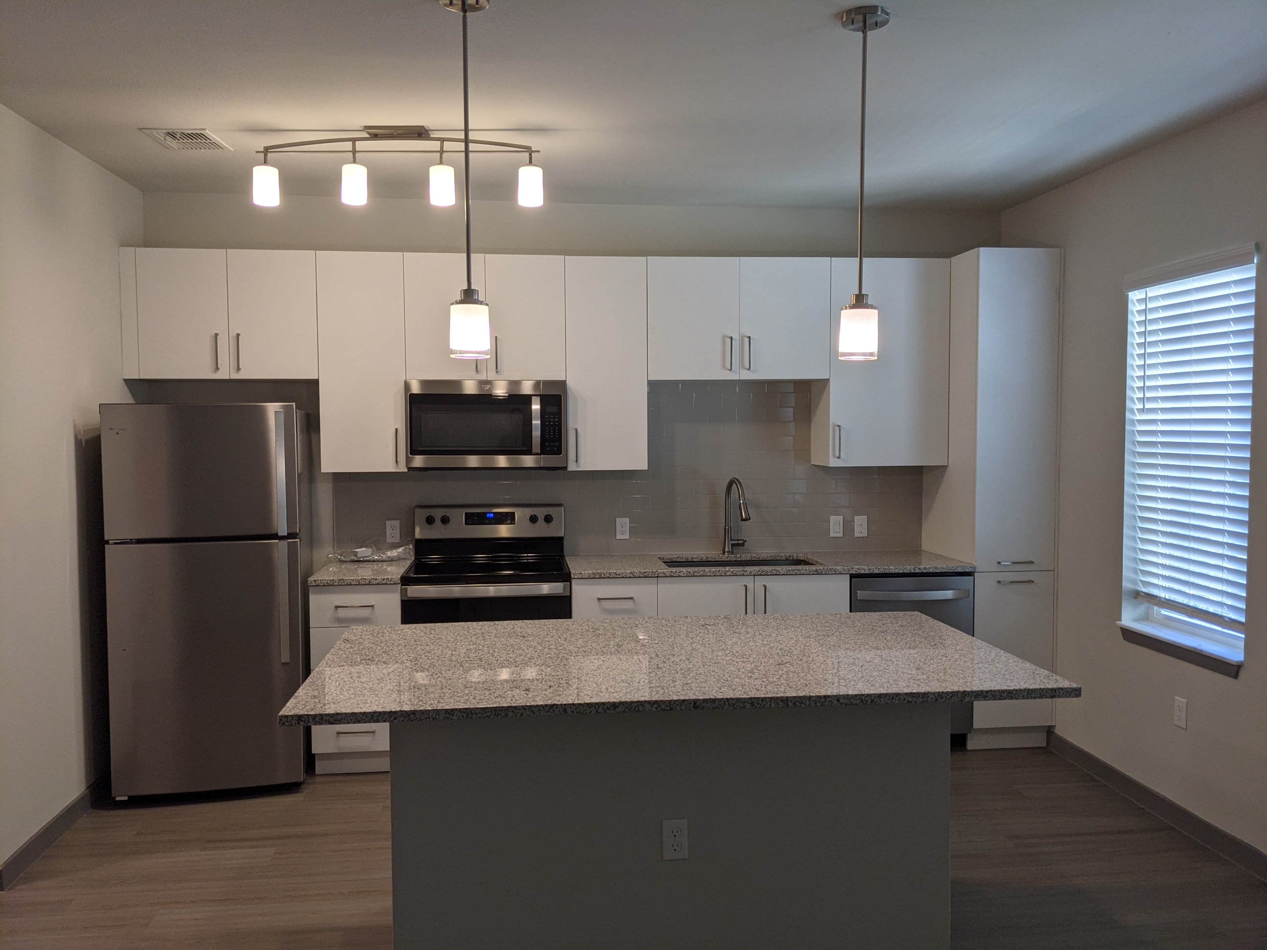 Tan gray kitchen multifamily